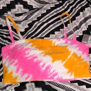 Never worn bathing suit top size L fits a medium.